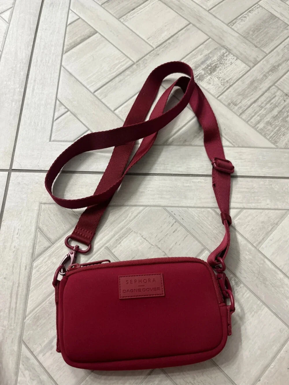 Dagne Dover Sephora colab bag. Burgundy crossbody with long strap brand new cond